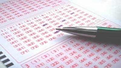 kupon Lotto oraz długopis do zakreślania liczb